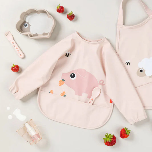 Babero grande con mangas y bolsillo Tiny Farm rosa 6-18 meses