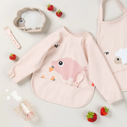 Babero grande con mangas y bolsillo Tiny Farm rosa 6-18 meses